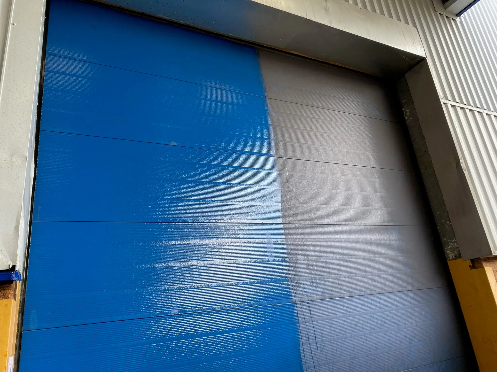 Powder coated aluminium cladding restoration on commercial building